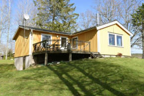 Nice cottage with a view of Teakerssjon